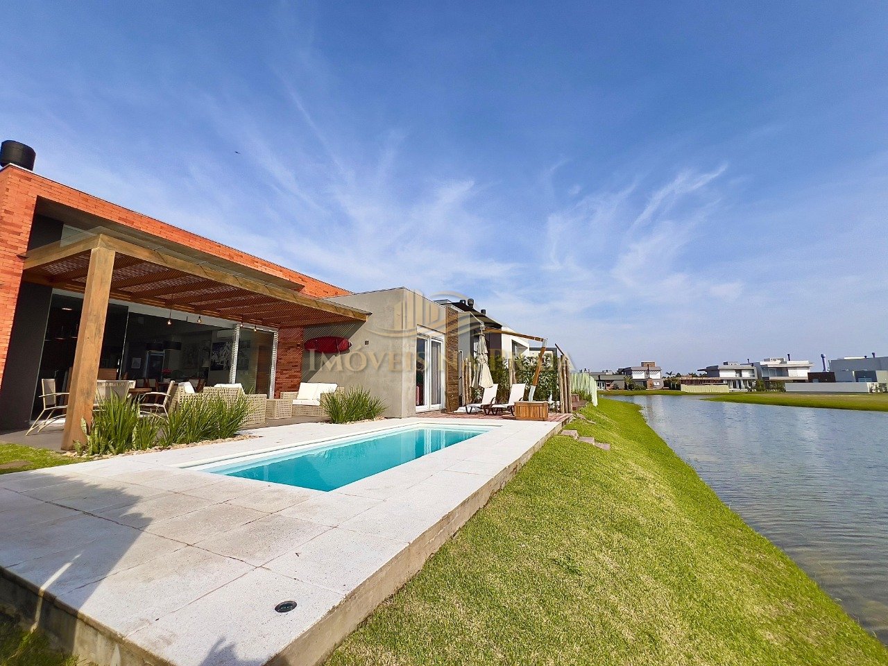 Foto 4 — Casa em condomínio no Riviera Xangri-Lá.