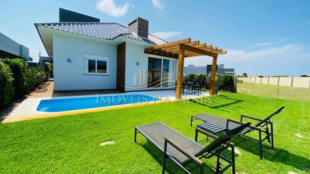 Foto 3 — Casa em Condomínio no Riviera Xangri-Lá.